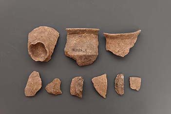 Neolithic pottery jars with lids
