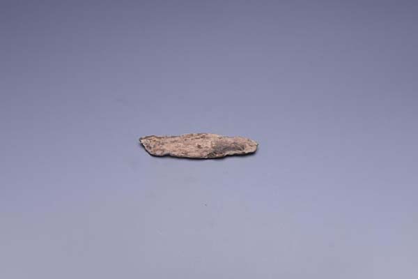 Neolithic flat bone arrowhead